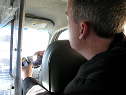 Chris programming the taxi driver GPS